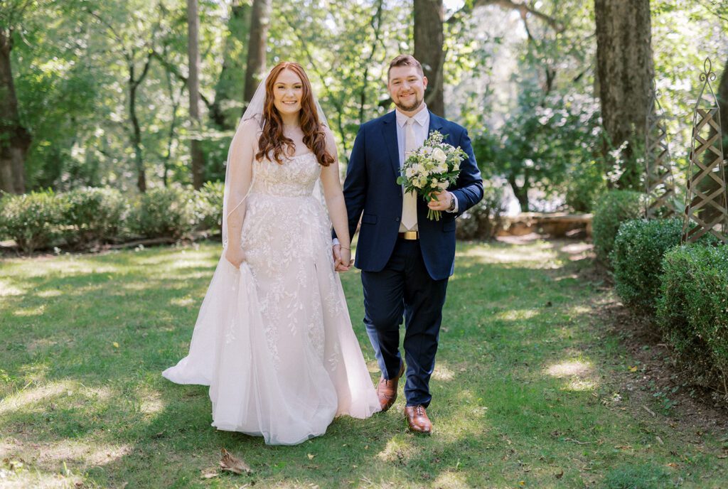 Bride and groom walking together during their Riverdale Manor wedding in Lancaster, Pennsylvania